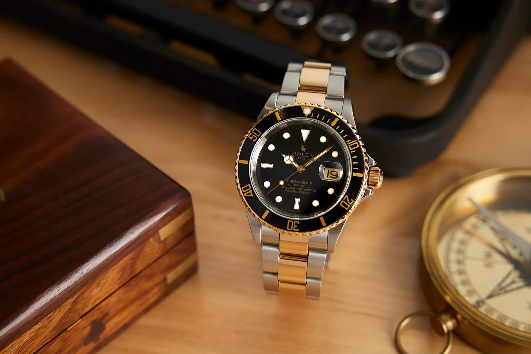 Rolex Submariner two-tone steel and yellow gold with black dial and bezel on Oyster bracelet