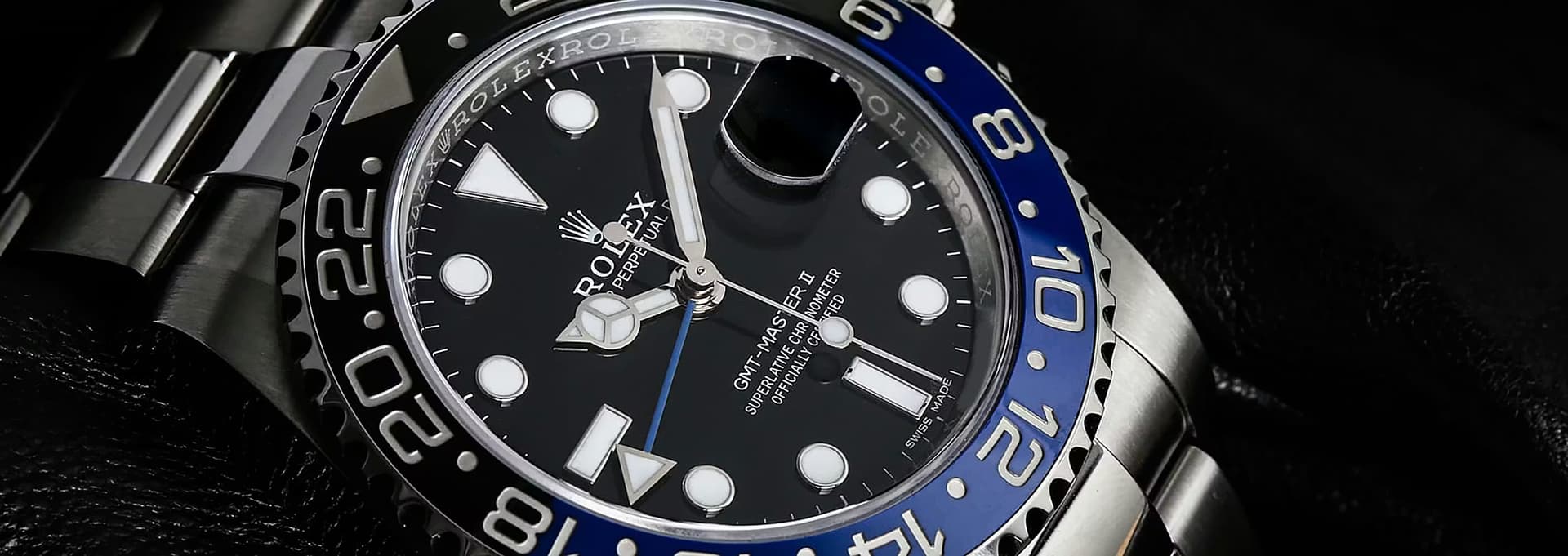 Rolex GMT-Master II Batman with black and blue bezel on Jubilee bracelet, luxury stainless steel sports watch