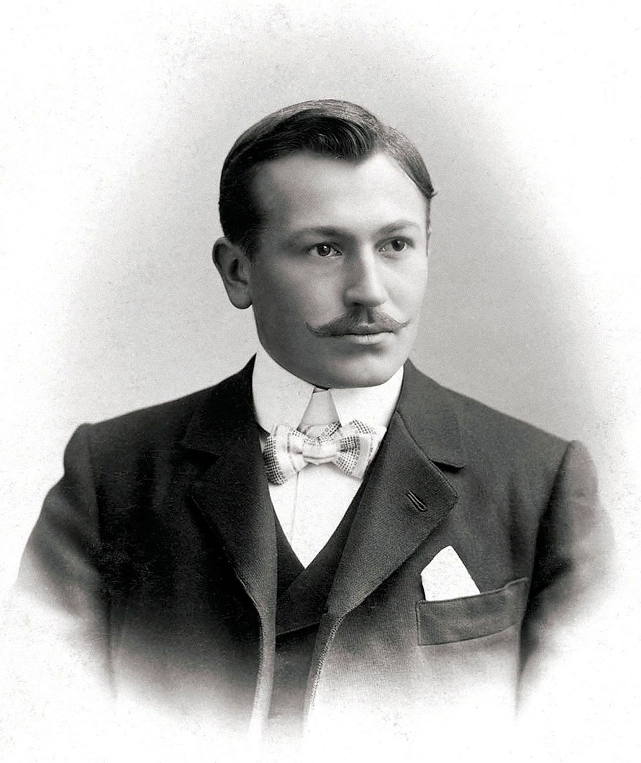 Hans Wilsdorf, the visionary founder of Rolex, in a vintage early 20th-century portrait photograph