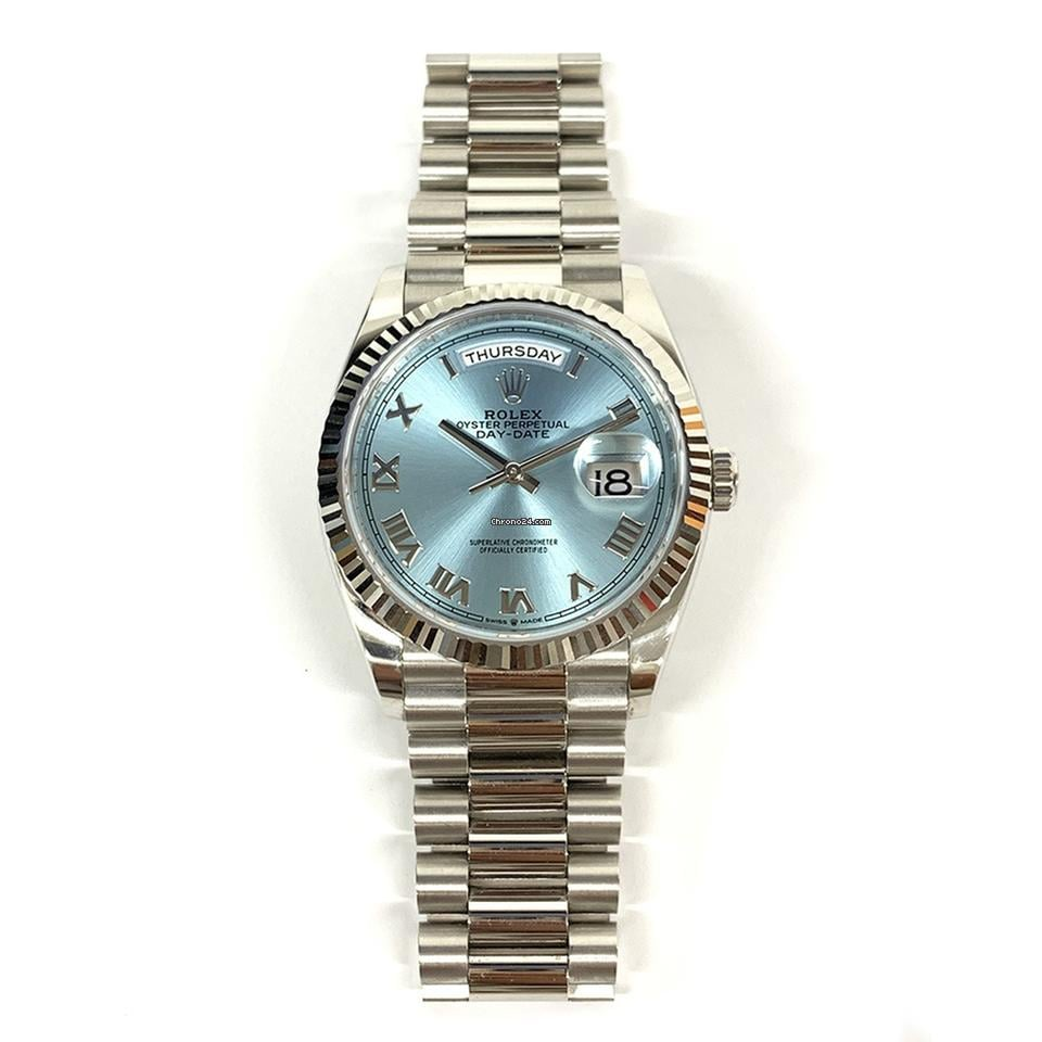 Rolex Day-Date in platinum with ice blue dial and Roman numerals, representing a premium luxury model