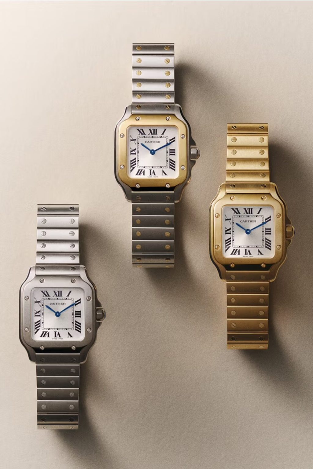 Three Cartier Santos watches in gold, steel, and two-tone designs with Roman numeral dials.