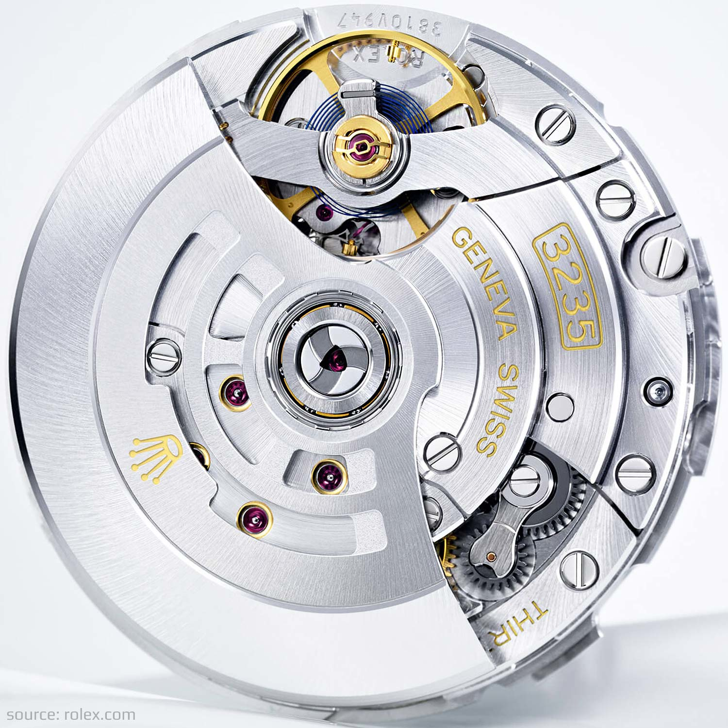 Close-up of Rolex Caliber 3235 movement showing detailed mechanical components and gold engravings