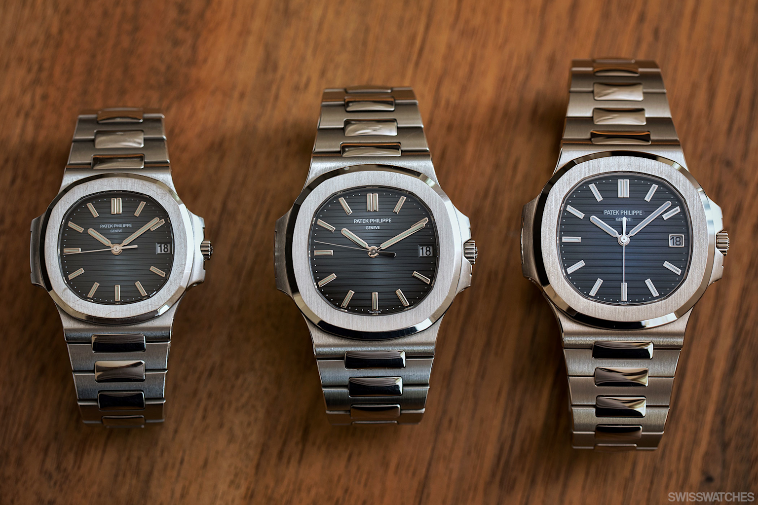 Three Patek Philippe Nautilus watches side by side showing the design evolution from early vintage to modern models