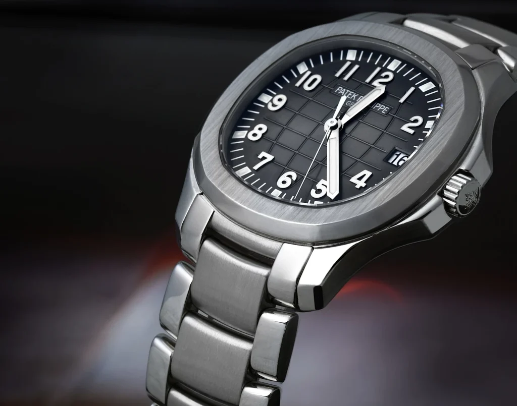 Patek Philippe Aquanaut stainless steel watch with black dial and integrated bracelet