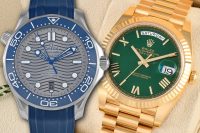 Rolex Day-Date in gold with green dial next to Omega Seamaster with blue strap and wave dial