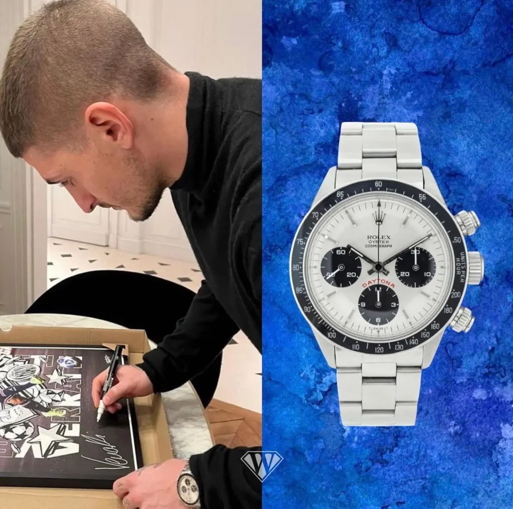 Rolex Daytona Paul Newman with white dial and black sub-dials in stainless steel on wrist and display.