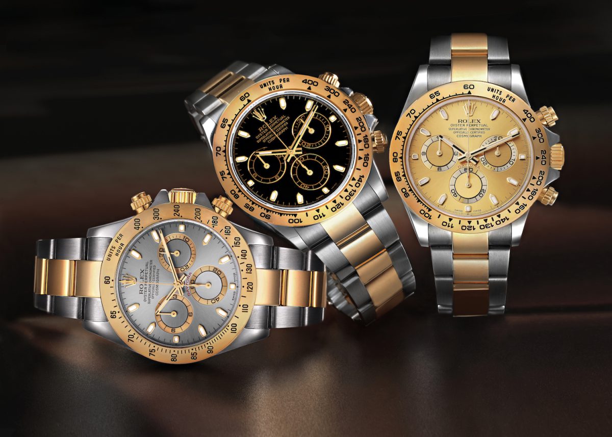 Three Rolex Daytona watches in two-tone steel and gold with black, champagne, and silver dials